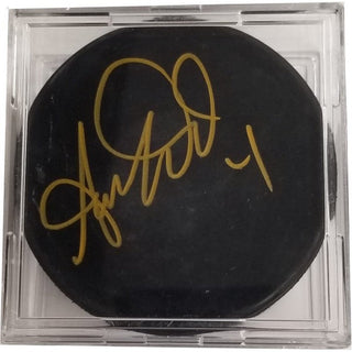 Autographed Hockey Puck: Aaron Ward