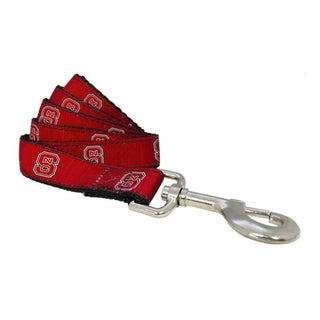 NC State Wolfpack Dog Leash: ﻿Even Fido loves "The Pack"! Show your & your pup's Pack pride with this NC State leash. Matches Collar: NC State Wolfpack - Red  Double stitched grosgrain ribbon sublimated team logos on heavy duty nylon webbing. Completed with top quality hardware.  Available Sizes: 4' and 6'   Officially licensed product.