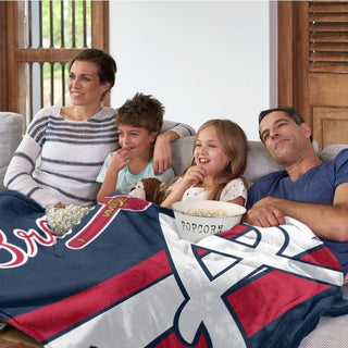 Snuggle up with the ultimate fan accessory: the Atlanta Braves Blanket! Crafted with ultra soft fabric, this 50” x 60” blanket is sure to be the perfect companion for cool evenings and lazy Sundays. Call your friends and family, and let the fan experiences begin!