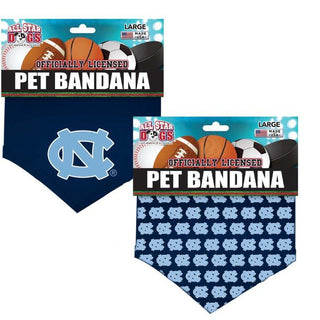 University of North Carolina Tar Heels Dog Bandana  Cotton Shirting pet bandana with embroidered UNC logo. Also available as all-over print sublimated poly blends. Traditionally tied or with the collar running through the opening.  Sizes: Small – 22", Large – 30"  Officially licensed product.  Made in the USA