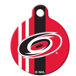 Let your pet proudly rep the Carolina Hurricanes with this official team tag! Crafted with recycled stainless steel, this double-sided tag sports the Hurricanes' logo and won't easily slip off any collar or key ring. Your furry friend won't even have to migrate for this one; it's made right in the USA! Go 'Canes!