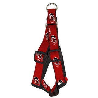 Dog Harness: Carolina Hurricanes - Red - Every Canes Canine will love to rock this Hurricanes harness! This red collar is made of double stitched grosgrain ribbon sublimated team logos on heavy duty nylon webbing. Completed with top quality hardware.   Matches our Dog Leash: Carolina Hurricanes - Red  Officially licensed product.  Made in the USA