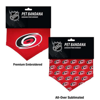 Carolina Hurricanes NHL Dog Bandana:  Let your favorite Canine show off their Cane Pride with this colorful bandana! Cotton Shirting pet bandana with embroidered Canes logo. Also available as all-over print sublimated poly blends. Traditionally tied or with the collar running through the opening.  Sizes: Small – 22", Large – 30"  Officially licensed product.  Made in the USA